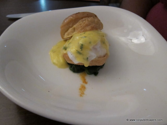 Poached duck egg, rarebit topped choux bun, béarnaise
