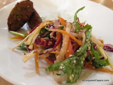 Picture of squash falafel with a rainbow carrot salad 